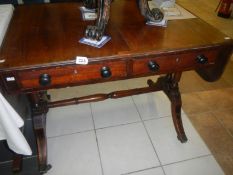 A Victorian mahogany sofa table