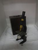 A cased microscope