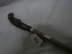 An eagle top walking stick with silver collar