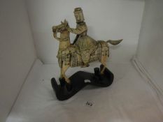 A carved bone Japanese warrior on horse, a/f