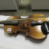 A Viola with Stradivarius label and bow marked Eric Steiner