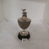 An Early 19th century Emu egg inkwell mounted on silver (no hallmark) with hinged top (egg has