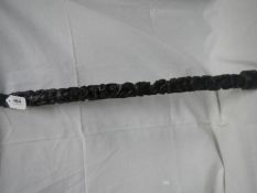 A carved tribal stick