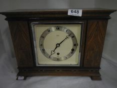 A 1950's 8 day Westminster chime mantel clock presented for loyal service by Everard's brewery