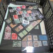 A large quantity of stamps including German Hitler stamps