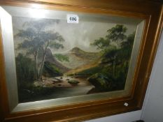 A framed & glazed oil on canvas mountain river landscape, signature indistinct, 43x29cm