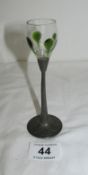An Arts and Crafts glass on pewter stem