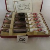 A cased set of 6 Crown Derby butter knives