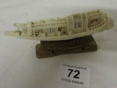 A carved ivory ceremonial barge