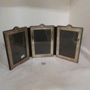 A triple silver photo frame, hallmarked Birmingham 1991