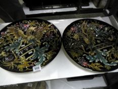 A pair of majolica chargers