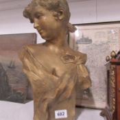 A pottery bust of a female signed A Foretay