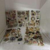 A good mixed lot of costume brooches