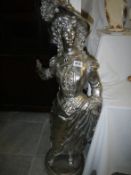 A large cast metal silver painted figure signed Roncoulet