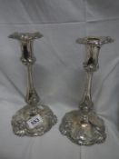 A pair of Sheffield plate candlesticks