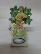 A rare Staffordshire 'Walton' girl with lamb figurine