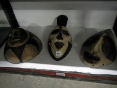 3 black and white tribal masks including Zongo