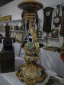 A Victorian majolica style jardiniere stand