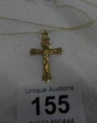 A 9ct gold Crucifix and chain