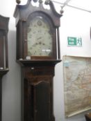 An 8 day long case clock in need of a clean