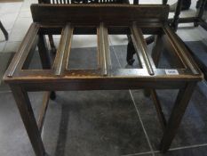 A Waring and gillow luggage rack