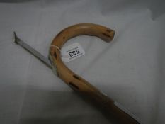 A Horse measuring walking stick