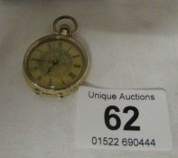 A 14kt gold ladies fob watch (in working order)