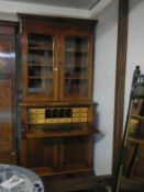 A secretaire bookcase