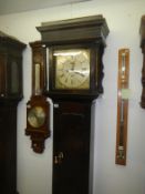 A Harmingham of Manchester 8 day Grandfather clock, 18C, brass face