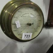A brass ship's style barometer