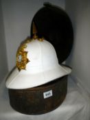 A 1960'a Devonshire and Dorset bandsmans helmet in tin