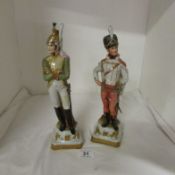 A pair of Italian porcelain military figures signed V. Lamagna