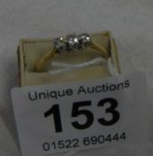 An 18ct yellow gold 3 stone diamond ring