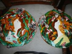 A pair of majolica plates