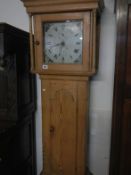 A late 18C early 19C stripped pine long case clock by Joseph Ham, Liskeard