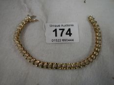 A 14ct gold bracelet set diamonds