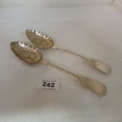 A pair of Georgian silver fruit spoons