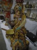 A Victorian majolica style jardiniere on stand