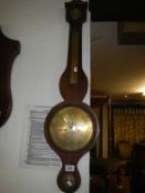 A Victorian brass dial wheel barometer in oak case