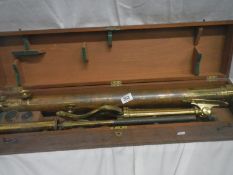 A cased brass telescope