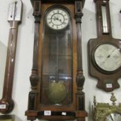 A mahogany Vienna wall clock