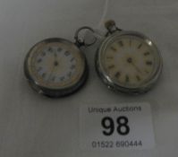 2 silver fob watches (1 hand missing on 1 and back loose on other)