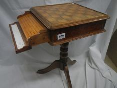 A chess table with cribbage board drawer