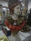 A large bust of a lady