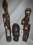 2 tribal figures and a bust including Khalifa Baharain