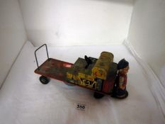 A tin plate clockwork railway truck