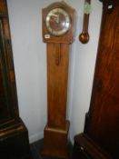 A pale mahogany Grandfather clock