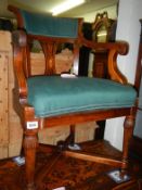 A 19C inlaid mahogany carver chair