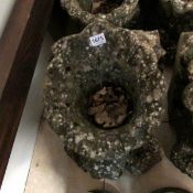 A Haddon stone shell garden urn