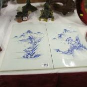 A pair of large hand painted Oriental tiles
A pair of large hand painted Oriental tiles
